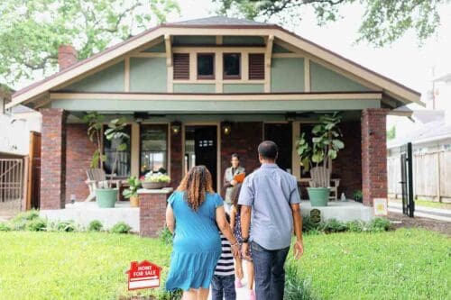 Clients meeting with a professional real estate agent