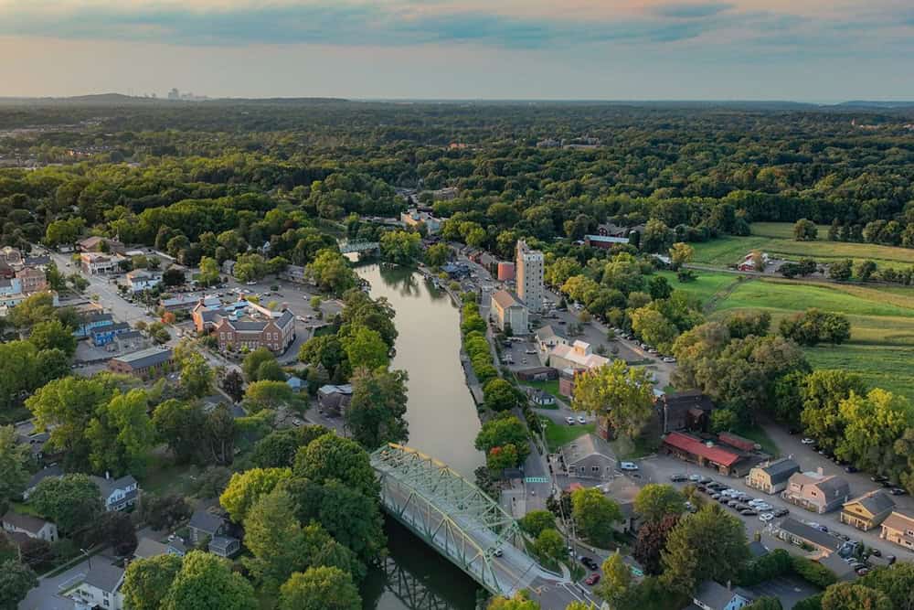 NY: Early evening aerial photo of Schoen Place and the Erie Canal in the Village of Pittsford, New York.