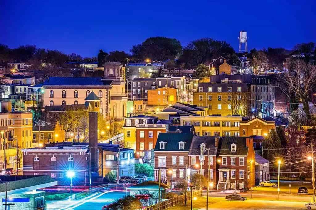 VA: Richmond, Virginia Neighborhoods and cityscape at dusk.