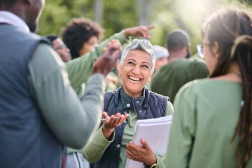 agent participating in community event – real estate lead generation ideas