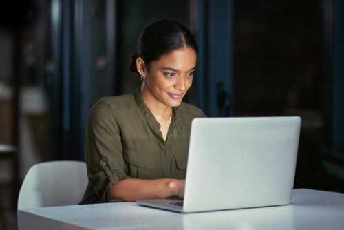 real estate agent works late into the night to achieve perfection