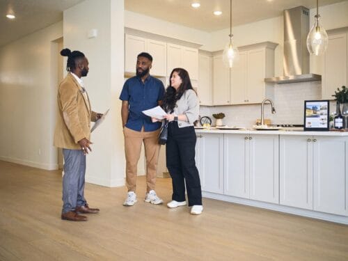 property manager shows apartment to couple