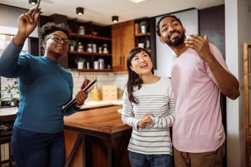 Real estate agent prepares sellers to stage home.